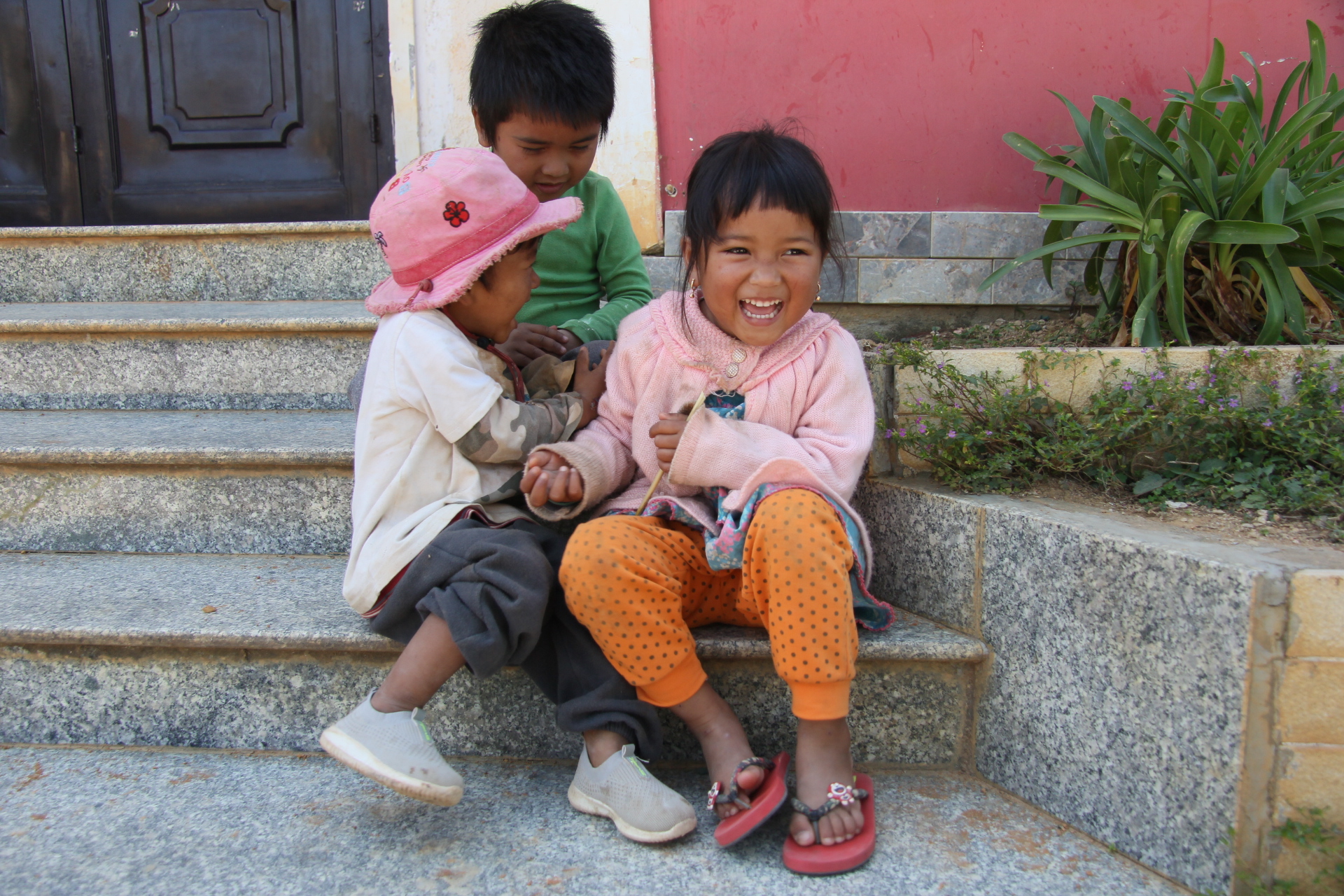 Children playing and laughing together.